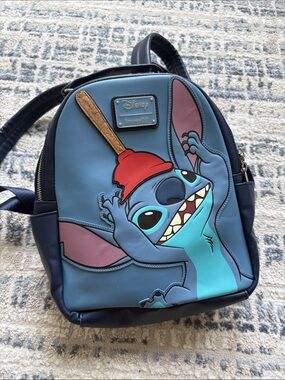 Loungefly Blue Stitch Backpack with Red Plunger Accent